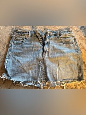 American Eagle Light Wash Denim Mini Skirt with Frayed Hem